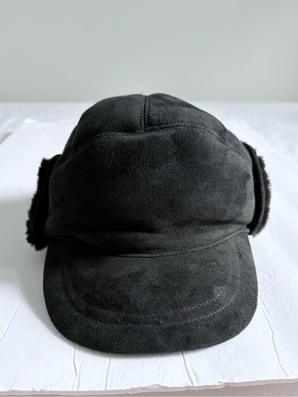 UGG Men’s Black Suede Cap with Fold-Down Ear Flaps